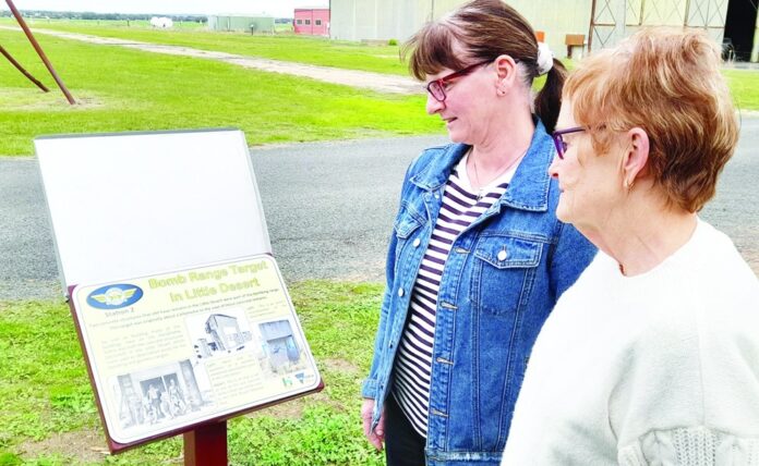 Wendy Crowhurst and Noella Smith take a look at the new NAHC Heritage Walk signs