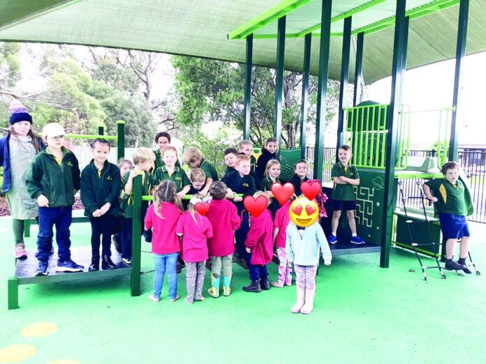 Children return to playground they helped design