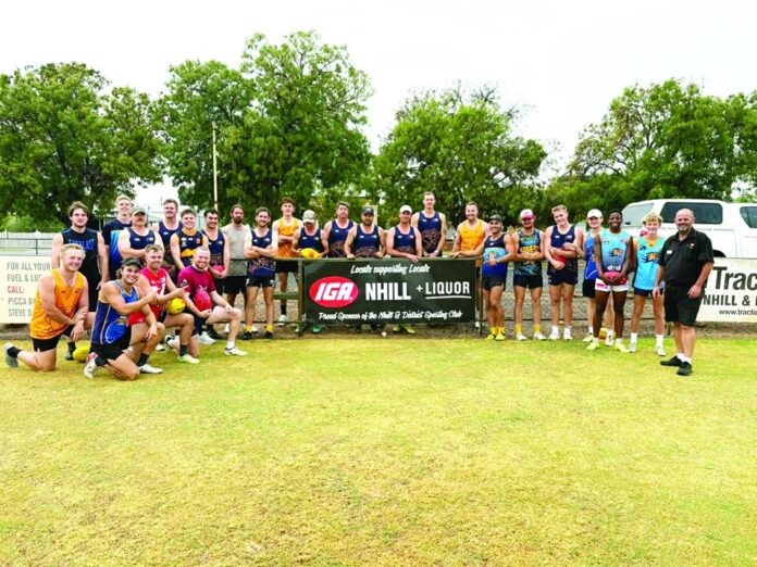Nhill Tiger players and IGA’s Scott McCurdy.