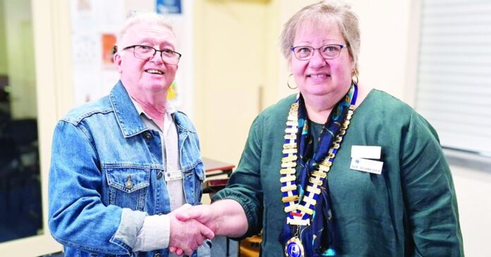 Wes Dean inducting Sue Schneider as Club President for 2026-2027