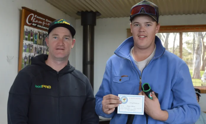 A Grade Pointscore event winner, Zander Hawker with club president Ash Hawker.