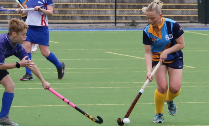 Nhill Thunderbirds’ Nellie Gill works the ball through the centre under pressure from young Jonas.