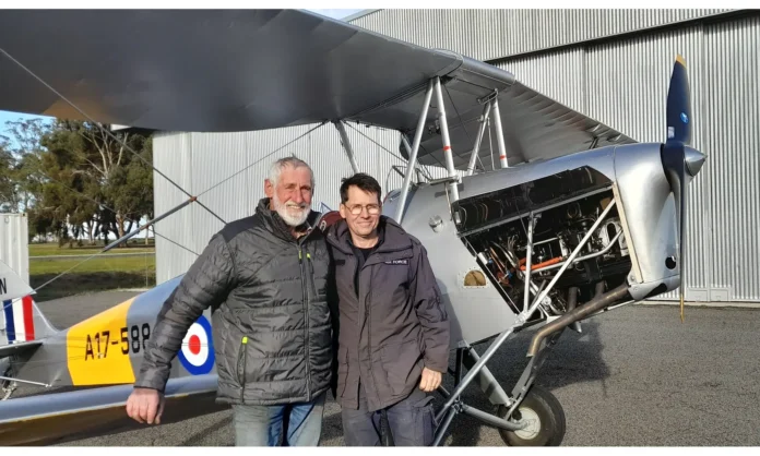 Len and Brian Creek with the refurbished Tiger Moth.