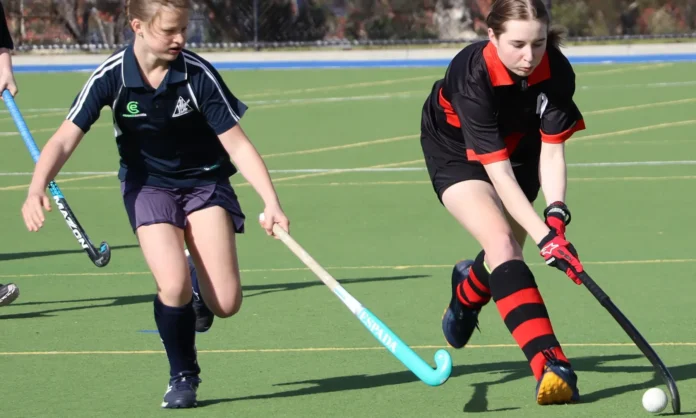 Yanac Warriors’ Savannah puts some good pressure on her Horsham Bombers opponent Jayda. Photo Rachel Clark