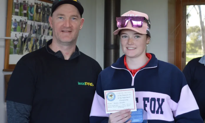Championship second place in C Grade, Bridey Hawker with club president Ash Hawker