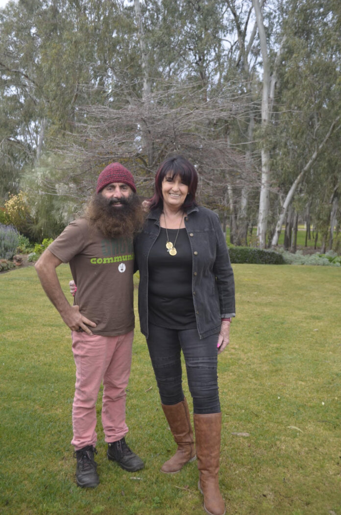 Nhill Lion Secretary Lesley enjoyed the company of Costa as the TV garden icon promoted the Nhill Garden Walk.